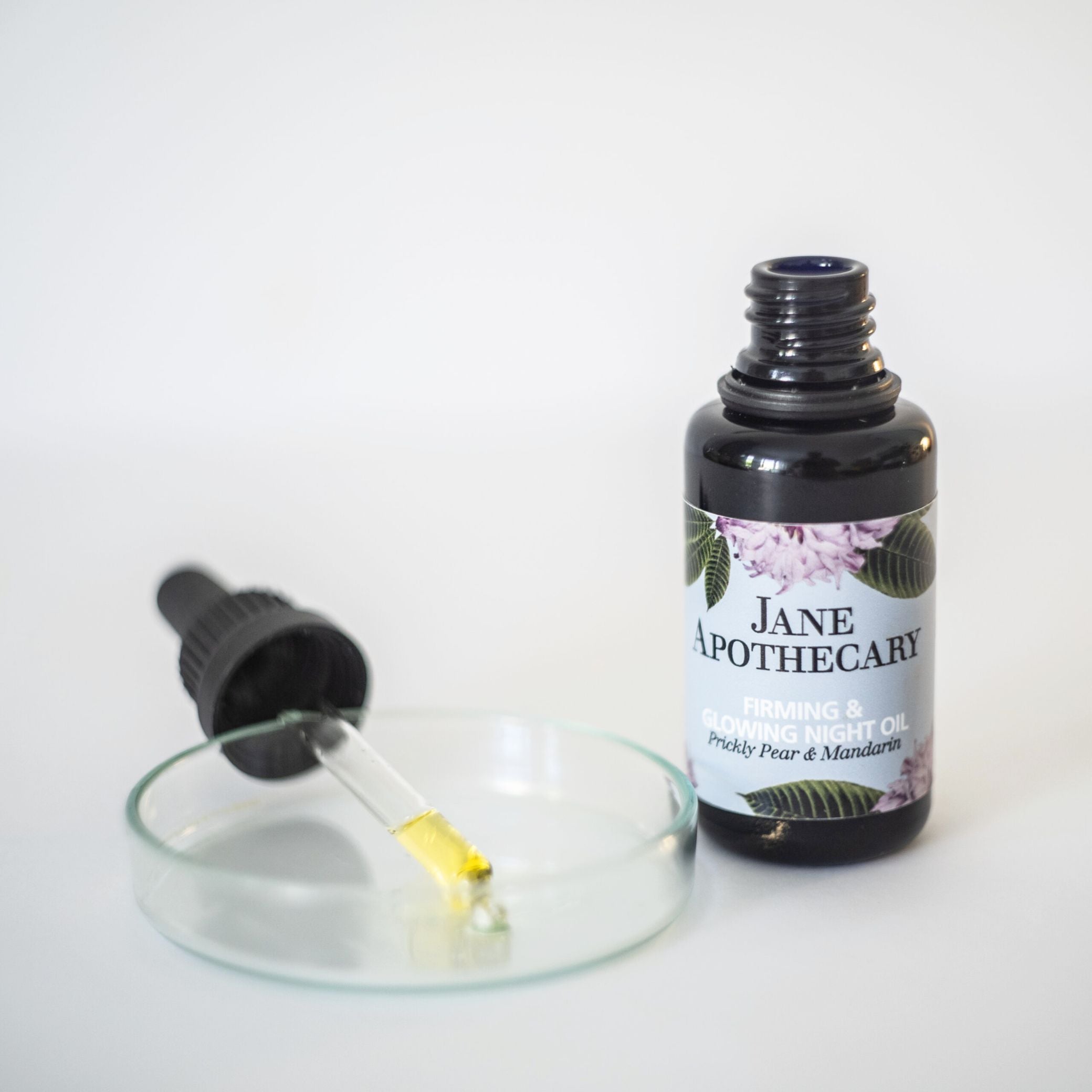 Aceite facial de noche reafirmante e iluminador